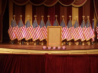 American Flags behind a podium