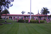 American flags around a large flag pole.